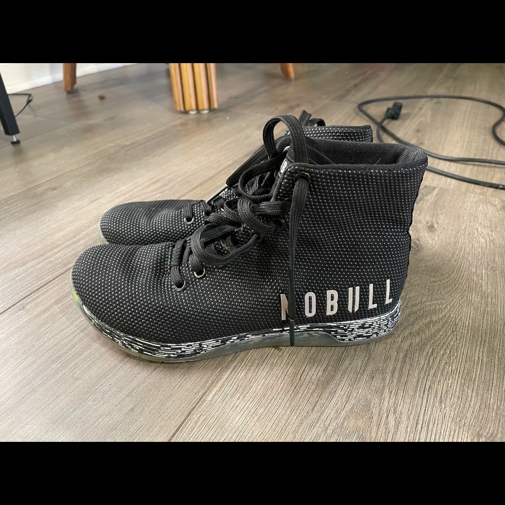 Black Nobull high top trainers.